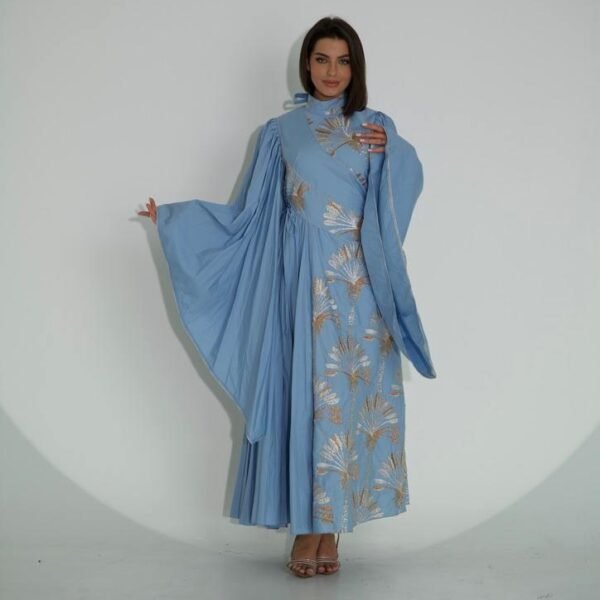 Elevate your wardrobe with the exquisite Blessea kaftan, adorned with stunning beadwork and intricate embroidery on luxurious plain fabric